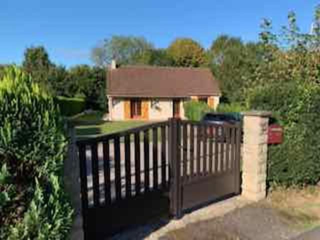 Maison traditionnelle avec jardin, idéale résidence secondai
