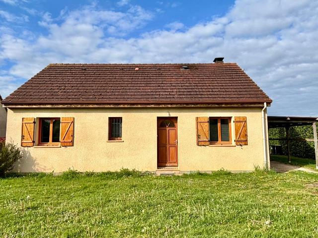 Maison traditionnelle de plain pied, alliant confort et fonctionnalité