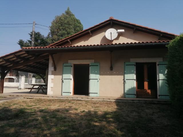 Maison trois chambres avec jardin et garage proche du centre