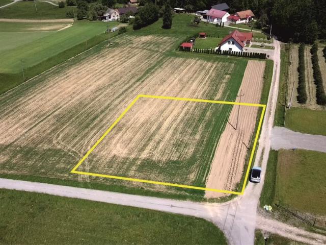 Malownicza działka 1985 m² z mediami i dojazdem asfaltowym