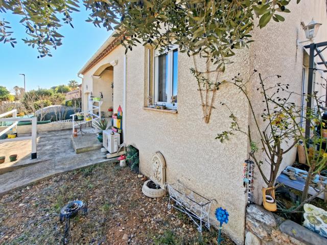 Maraussan, villa de plain pied, T4, 90 m2 avc garage sur un