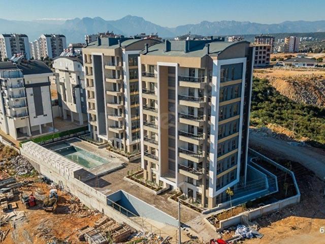 MASADAĞI'NDA KAPALI OTOPARKLIHAVUZLU SIFIR LÜKS DAİRE