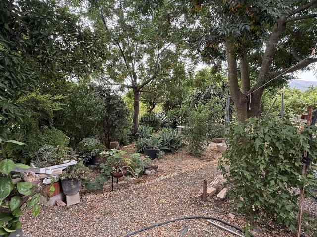 Masía en venta en Alhaurín el Grande, Centro. Casa de campo en una parcela totalmente plana de 1,000 m con piscina y jardín maduro en Alhaurín El Grande. REF F5447332. Masías Alhaurín el.