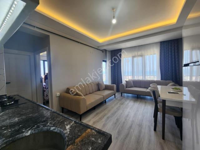 Mavi Atlas'tan Sıfır Eşyalı Deniz Manzaralı Kiralık 1+1 Daire