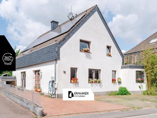 Meerbusch Bösinghoven: Großzügiges Zwei Parteienhaus mit ca. 260 qm Wohn und Nutzfläche