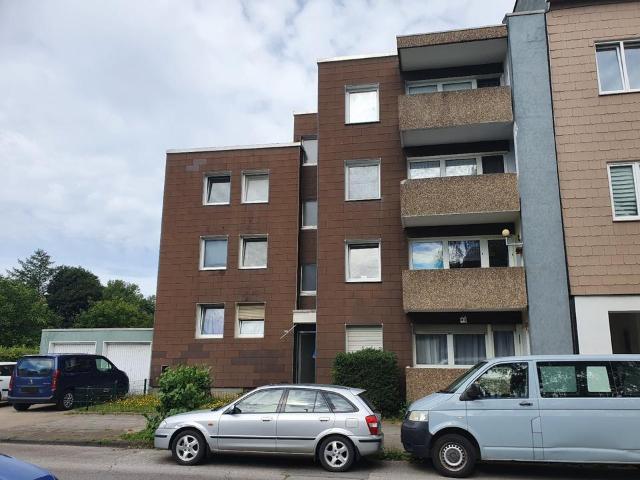 Mehrfamilienhaus mit 7 Wohnungen, 6 Garagen als Kapitalanlage