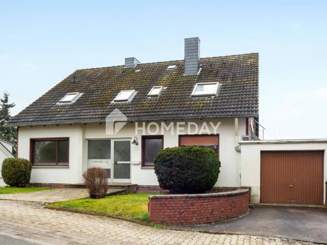 Mehrfamilienhaus mit 3 WEs, Garten, Garage & Stellplätzen vielseitige Möglichkeiten
