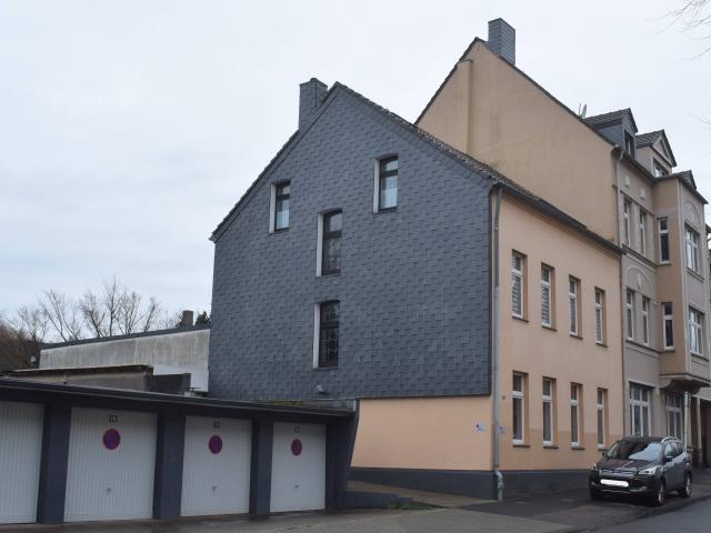 Mehrfamilienhaus mit Werkstatt und Hallenfläche überdachter Innenhof im Zentrum von Mülheim!