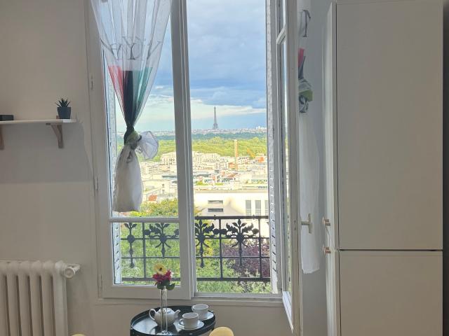 Mercy’s Home with Eiffel Tower view