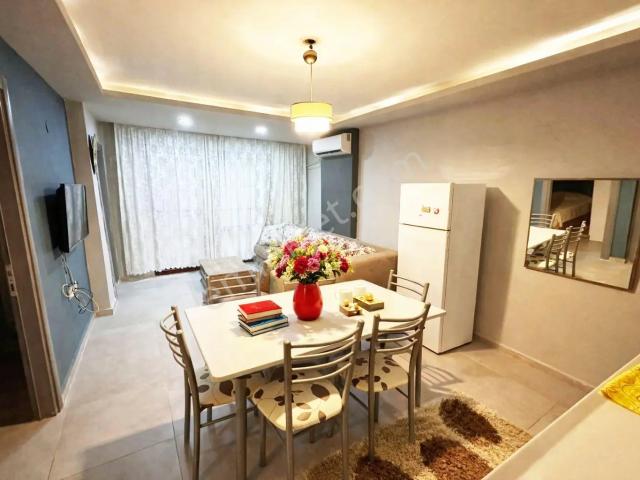 Merkezde eşyalı 2+1 Kiralık Daire denize 50 M. Kuşadası Türkmen