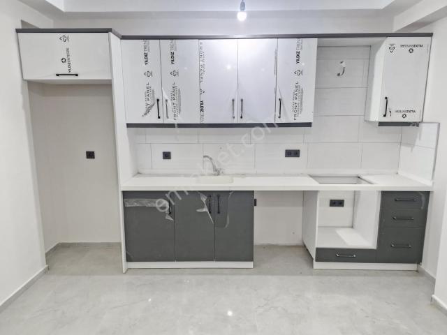Merkezi Konumda 1+1 Sıfır Kullanışlı Satılık Daire