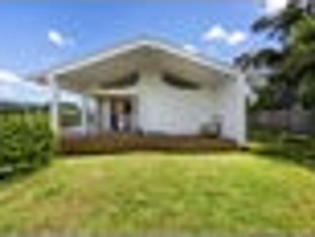 METICULOUSLY RENOVATED ON ONE ACRE OF LAND