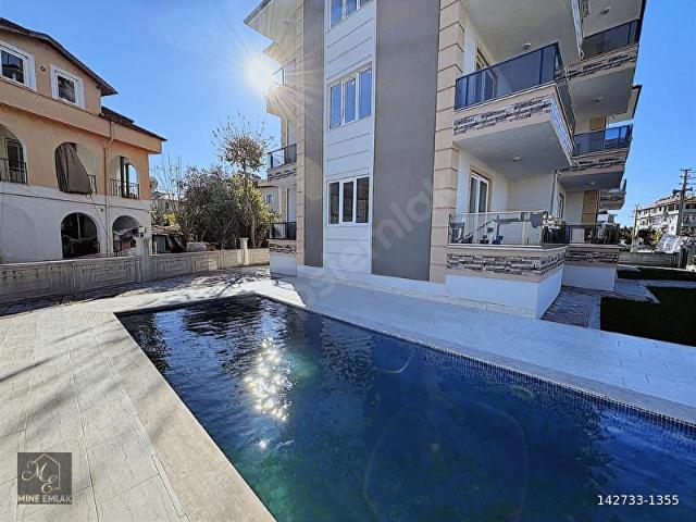 MİNE EMLAKTAN 1+1 HAVUZLU 68m2 GENİŞ DAİRE