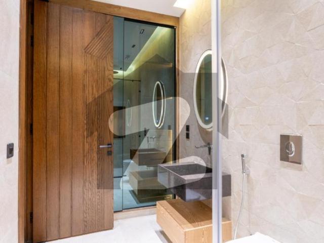 Minimally Designed 1Kanal Modern Designer House Available for Sale With an indoor Pool at Prime Location DHA Phase 6 Block K