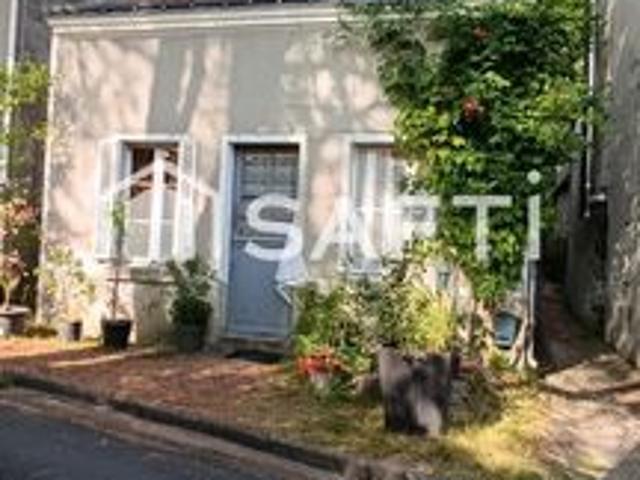 mignonne maison avec terrasse et jardin