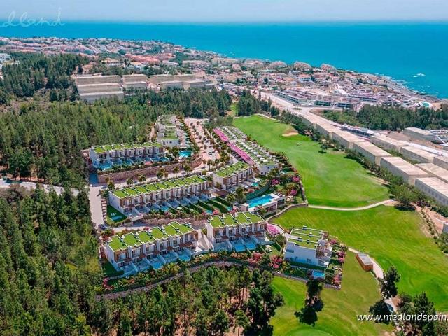Luksusowe domy z widokiem na golf i morze w Mijas