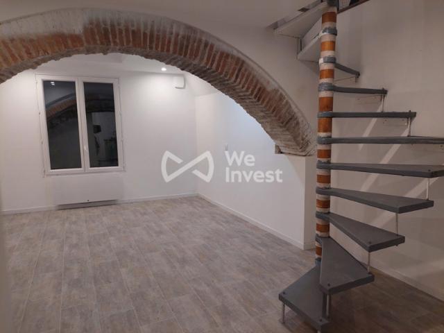 Souplex rénové de 55 m² en hypercentre avec chambre voûtée