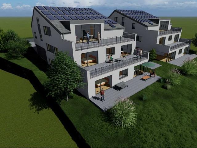 Mit Solar und Wärmepumpe Sonderpreis! Die ersten drei Käufer sparen 10% ! Tolle Lage oberhalb vom Weingut Weimar sehr praktische 3 Zimmer Wohnu
