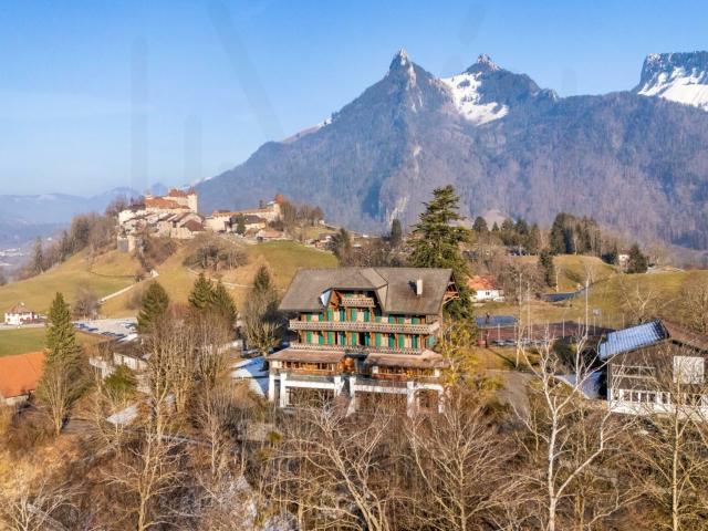 Mixed use building with 66 rooms on sale in Gruyères 1 671 m² | dreamo. Ch