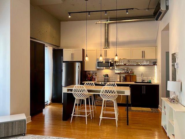 Montreal Furnished Condo Rental 2 Bed 2 Bath Loft in Mont Royal with a Beautiful Balcony