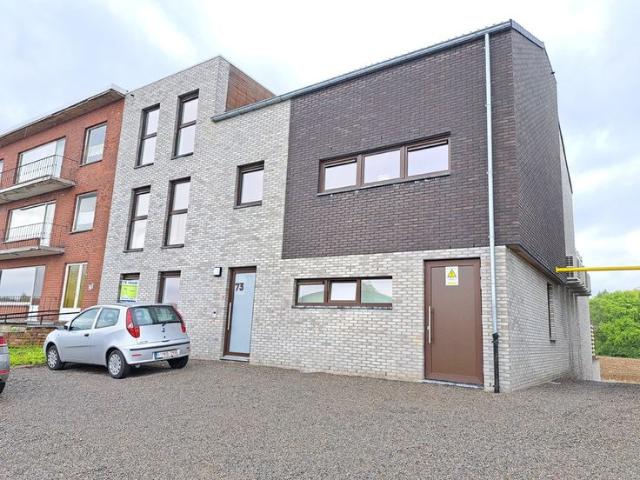 Mooi ruim energiezuinig gelijkvloers appartement te Dilsen