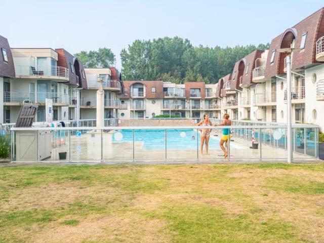 Mooi vakantieappartement met parking in groen domein met.