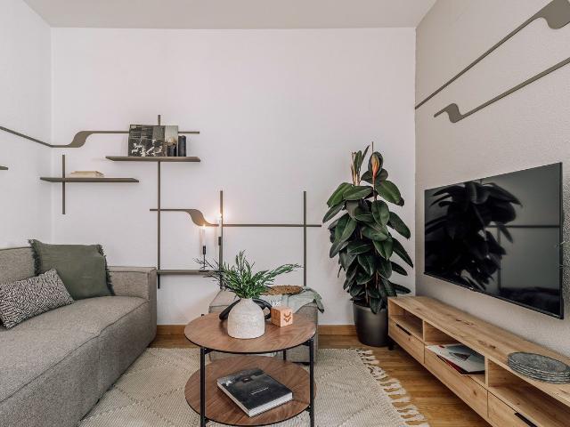Modern 3 Bedroom Apartment with Office and High End Amenities on Fernán González Street, Madrid Amsterdam Apartments for Rent