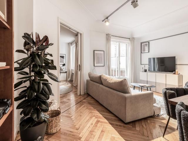 Modern 3 Bedroom Apartment with Terrace and Designer Furnishings in Almagro, Madrid Amsterdam Apartments for Rent