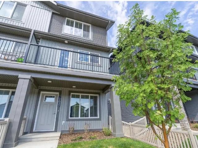 Modern 3 Bedroom Townhome with Attached Garage and Balcony move in READY