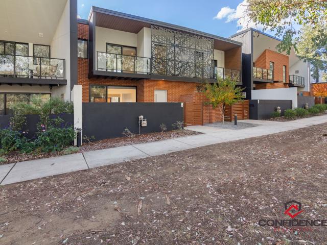Modern 3 Bedroom Townhouse with Secure Double Garage – Greenway Living at Its Best!