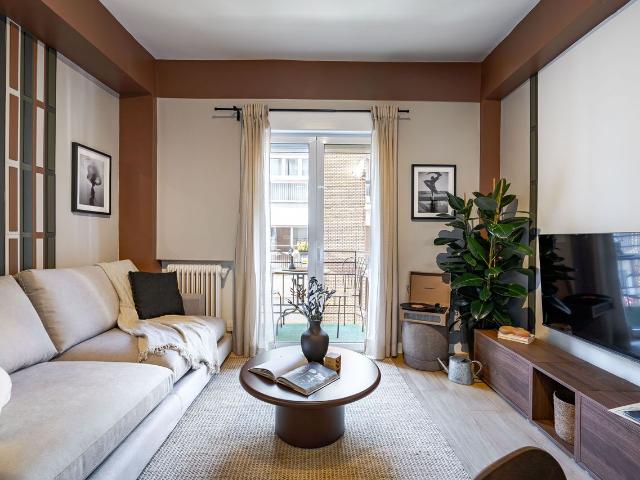 Modern 1 Bedroom Apartment with AC and Designer Furnishings in Palafox Street, Madrid Amsterdam Apartments for Rent