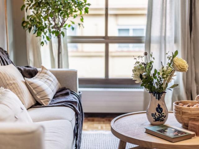 Modern 1 Bedroom Apartment with Grassland Inspired Design and Shared Pool in Almagro, Madrid Amsterdam Apartments for Rent