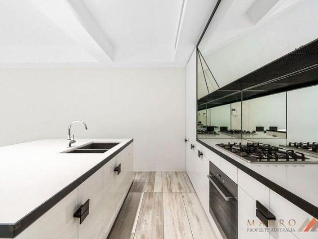 Modern 1 Bedroom Apartment in the Heart of Haymarket 69m² of Sophisticated Urban Living