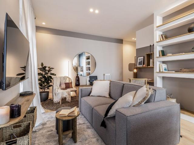 Modern 2 Bedroom Apartment with Spacious Terrace and Mountain Inspired Design in Chueca, Madrid Amsterdam Apartments for Rent