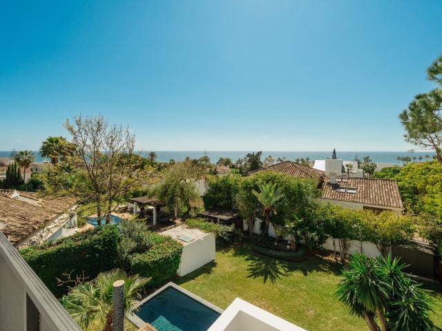 Modern 2 bedroom duplex holiday rental with private pool, sea views & garden in Marbella East