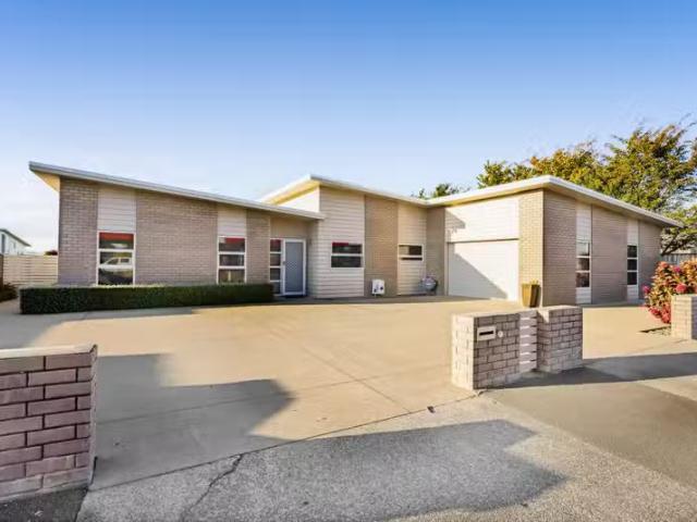 Modern Comfort Meets Prime Location – First National Real Estate