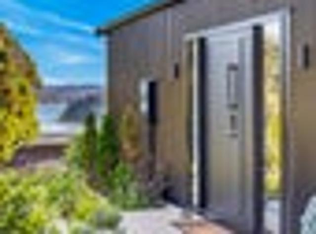Modern and majestic overlooking Matauwhi Bay