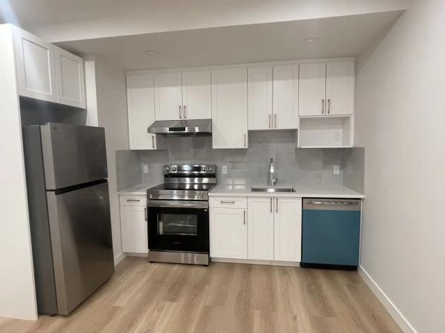 Modern and New Legal Suite + 9ft Ceilings | Steps to NEW Village!
