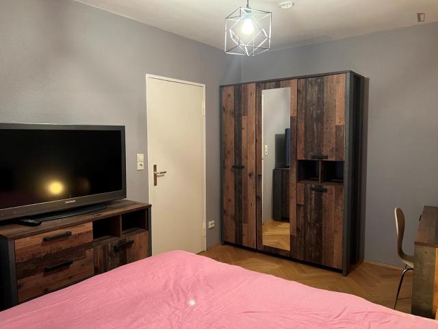 Modern bedroom with own bathroom and private balcony, in Wilmersdorf