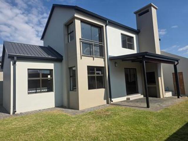 modern double storey home in a secur.