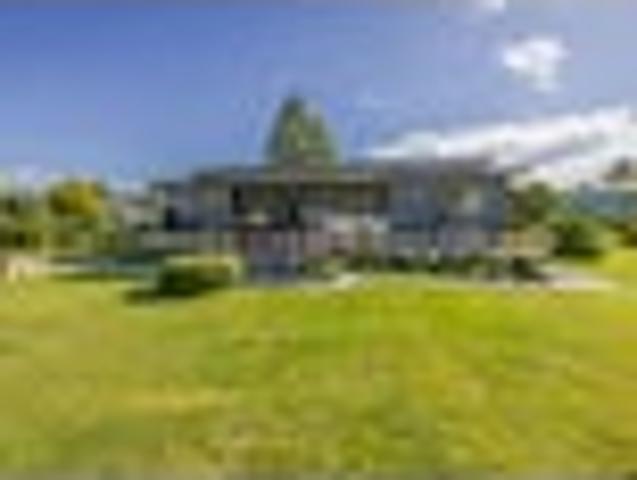 Modern home, beautiful gardens, village living