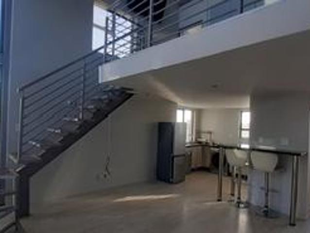 modern loft apartment with appliance.