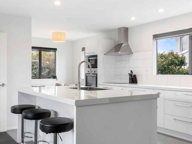 Modern, Spacious 4 Bedroom Home in Prime Location