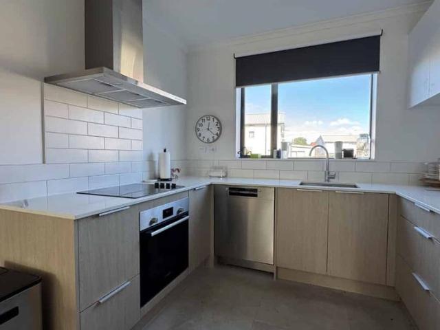 Modern Three Bedroom Townhouse in a Convenient Location