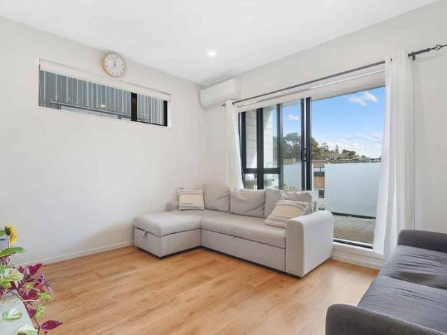 Modern three bedroom townhouse with internal access garage
