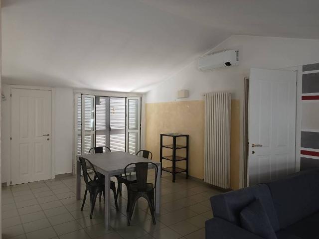 Moderna mansarda inpiccola palazzina