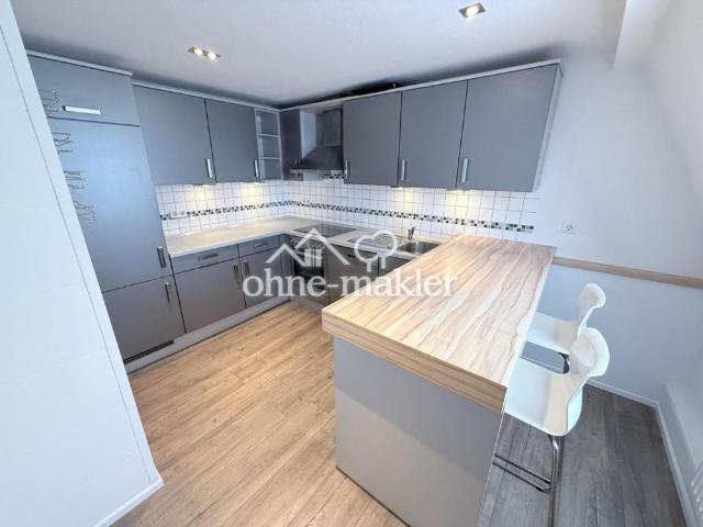 Moderne Eleganz: Stilvoll modernisierte Dachgeschosswohnung in bester Lage