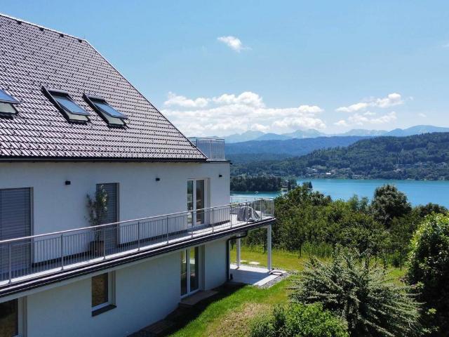 Moderne, Erstbezug Gartenwohnung mit Traumblick auf den Wörthersee! Touristische Nutzung möglich!