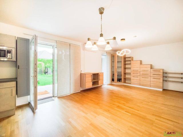 Moderne Gartenwohnung mit großzügiger Terrasse. Wohnqualität mit Top Ausstattung und Doppelstellplatz