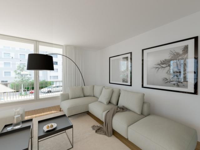 Moderne, helle Eigentumswohnung mit Balkon bei der Tramstation